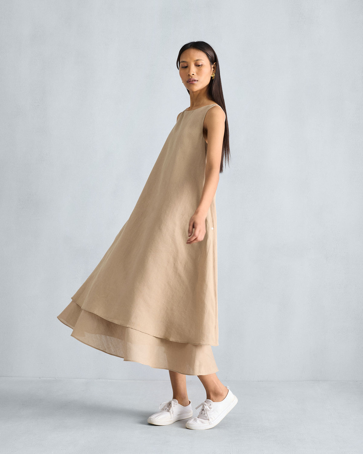 Beige Double Layer Dress showing a flowing tiered midi hem.