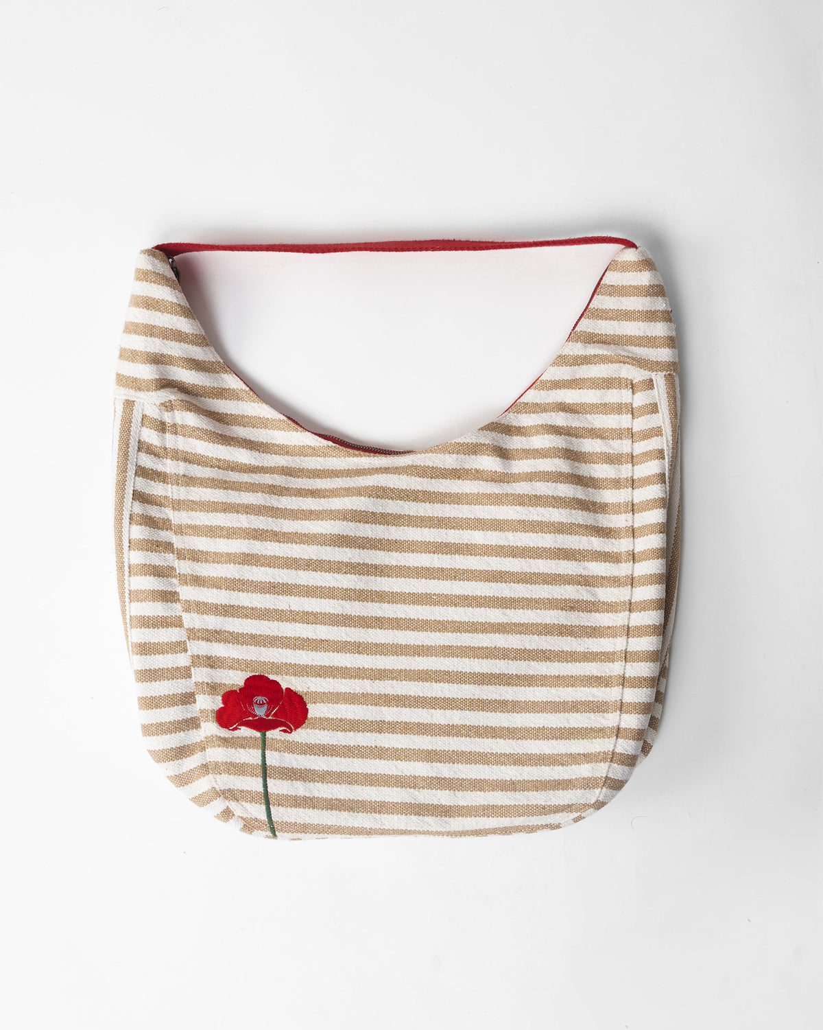 Beige striped Wayfarer bag with a red embroidered poppy.