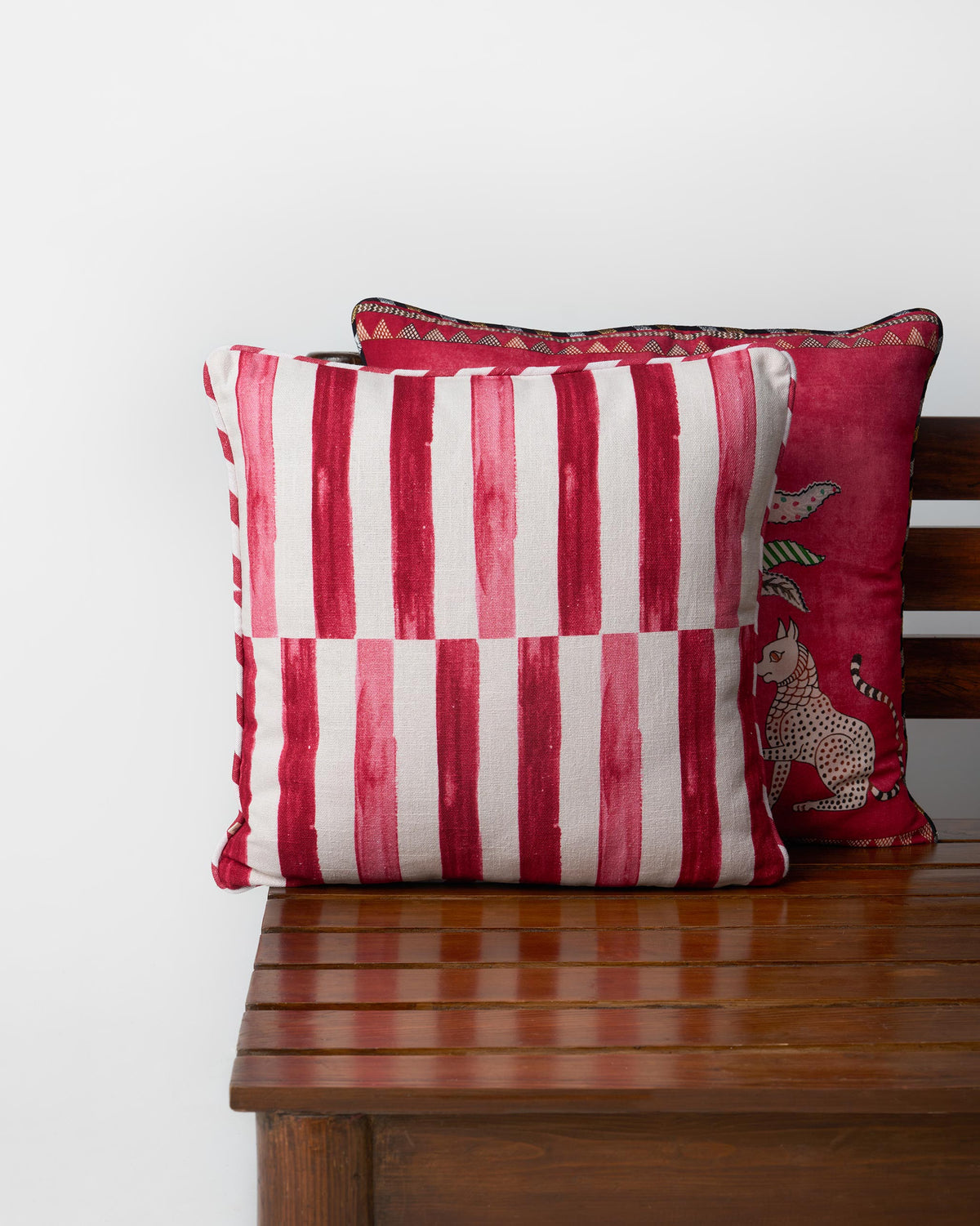 Red and white vertical striped cushion cover.