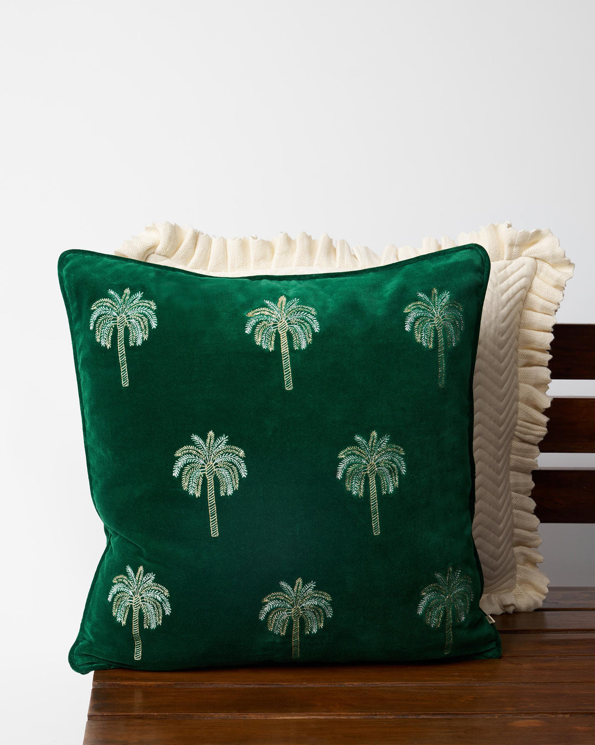 Palm Shimmer Cushion Cover in green with embroidered palm trees.