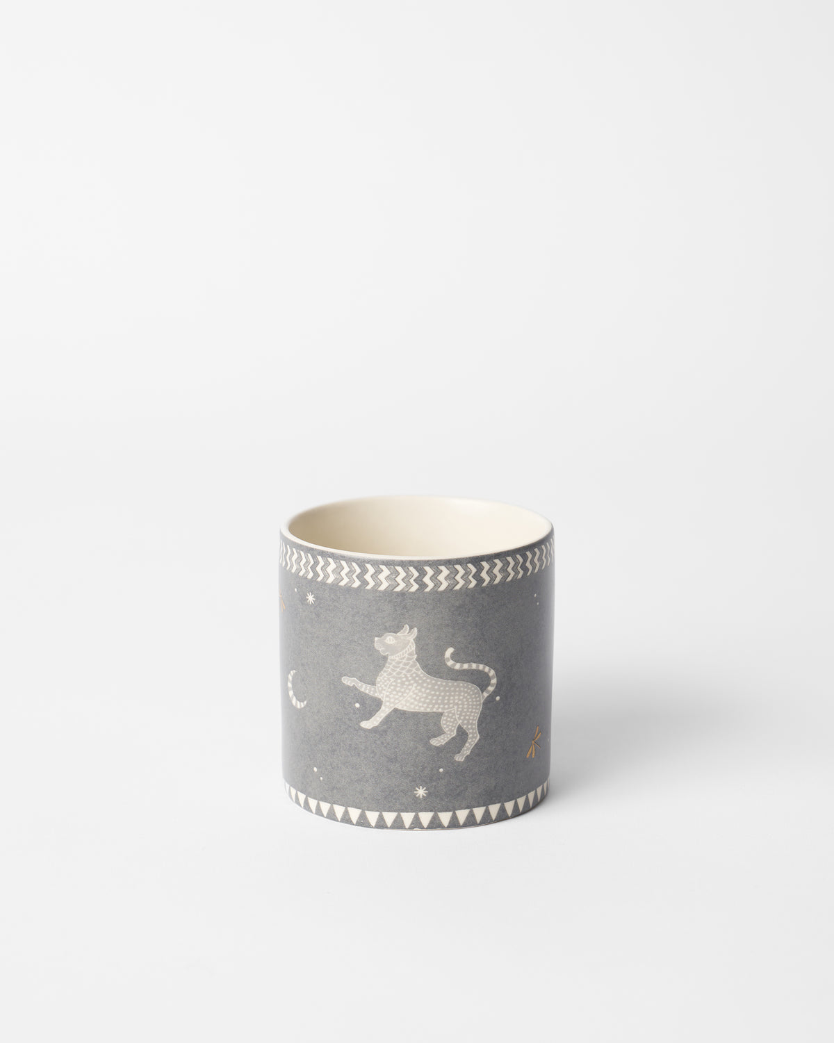 Bagh straight mug with a leaping leopard and crescent moon on grey.