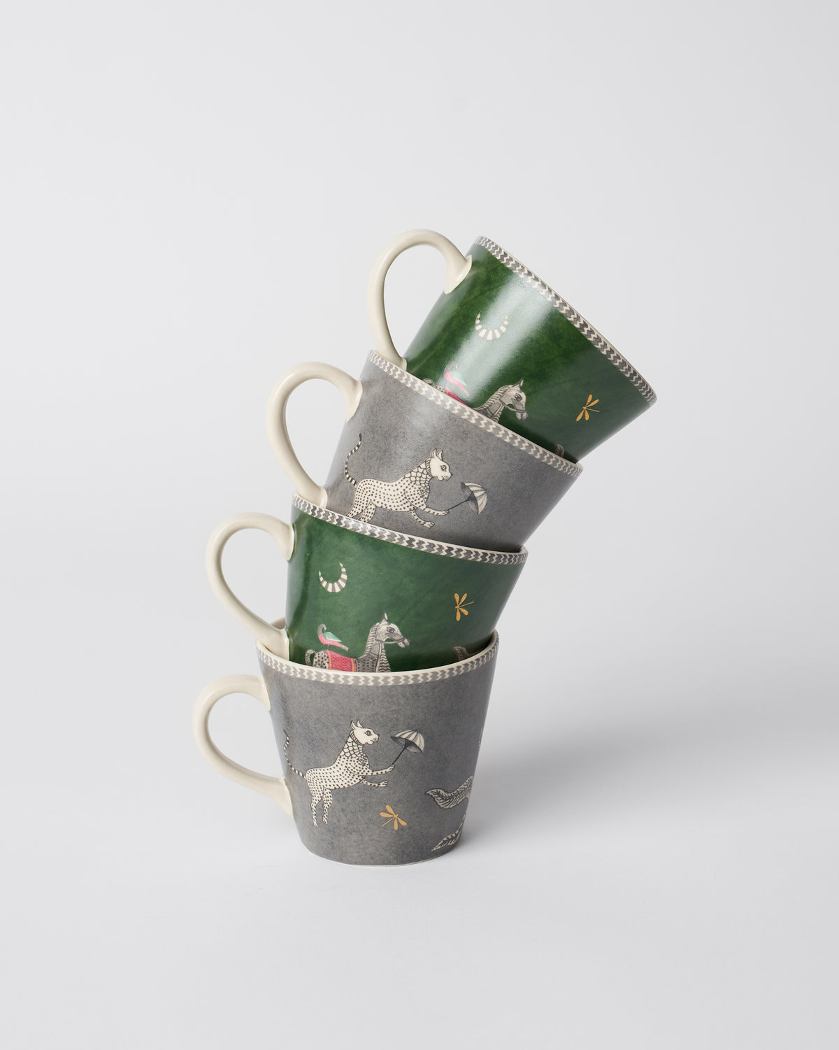 Tall stack of four Indus espresso mugs in green and charcoal.