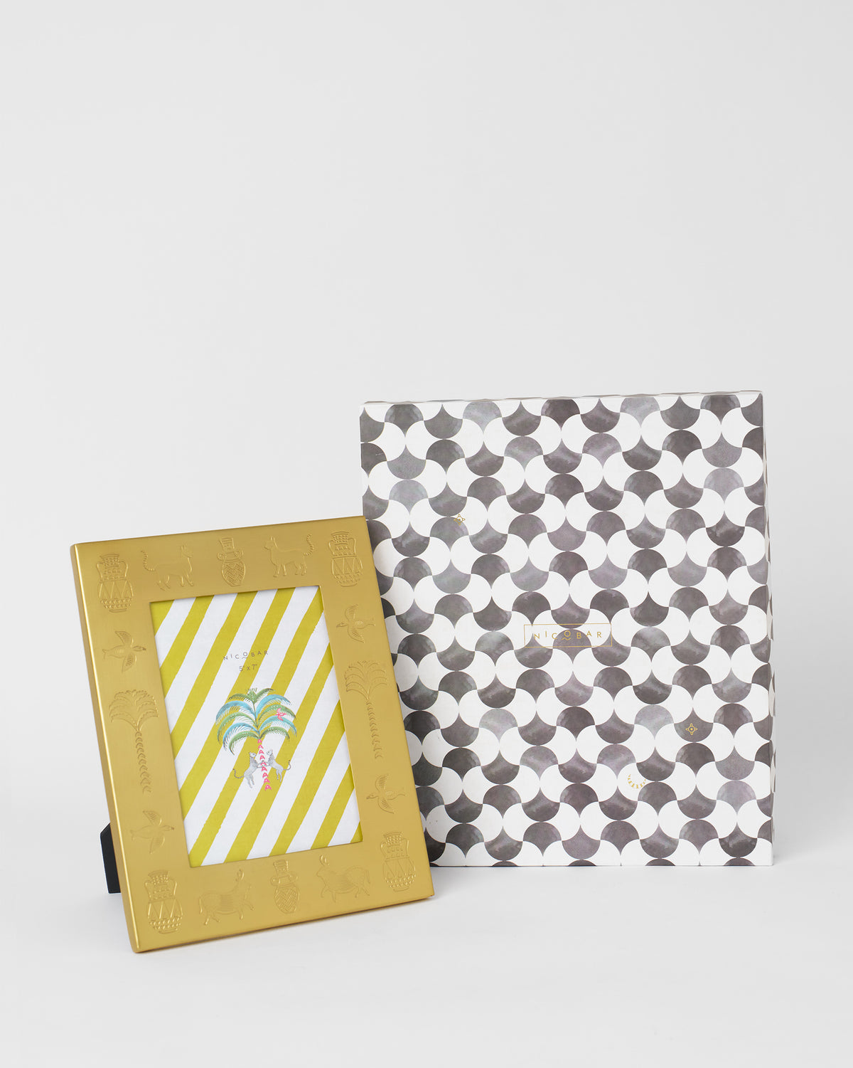 Indus photo frame in front of its patterned Nicobar gift box.
