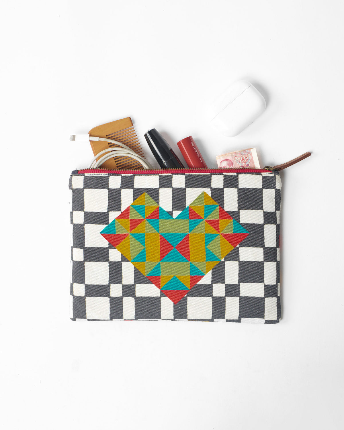 Multicolor Abstract Heart Pouch packed with everyday essentials.