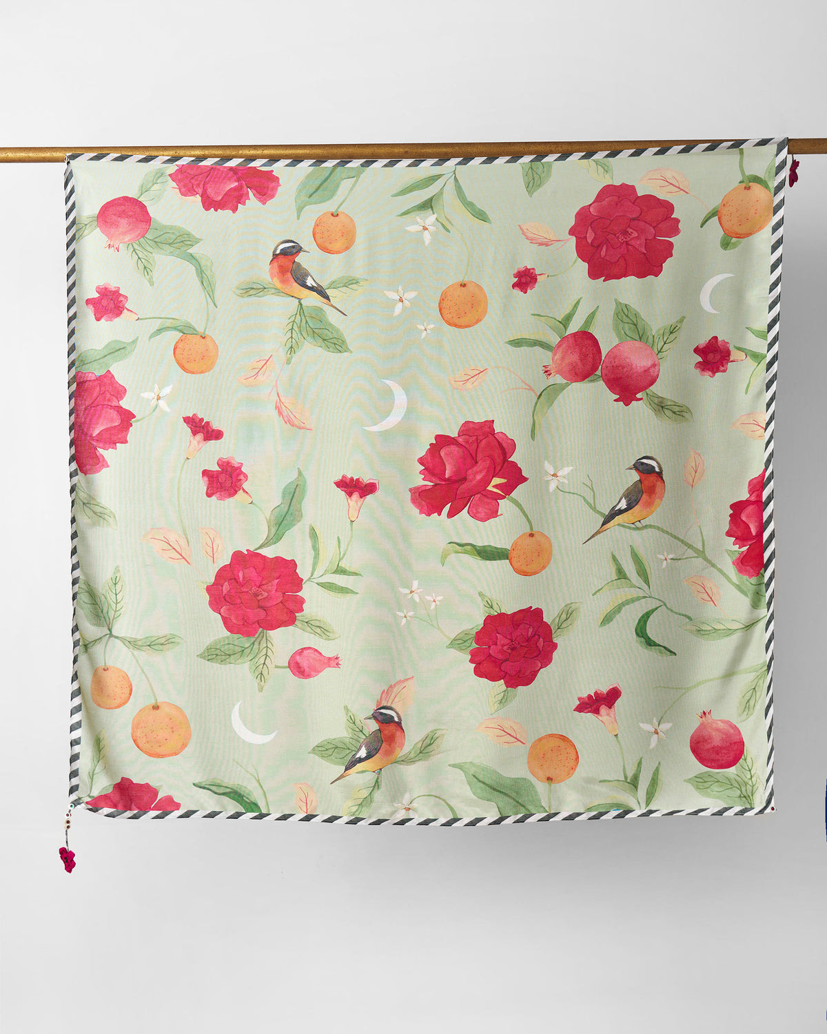 Dusk Garden scarf hung flat, showing birds, roses and crescent moons on mint.