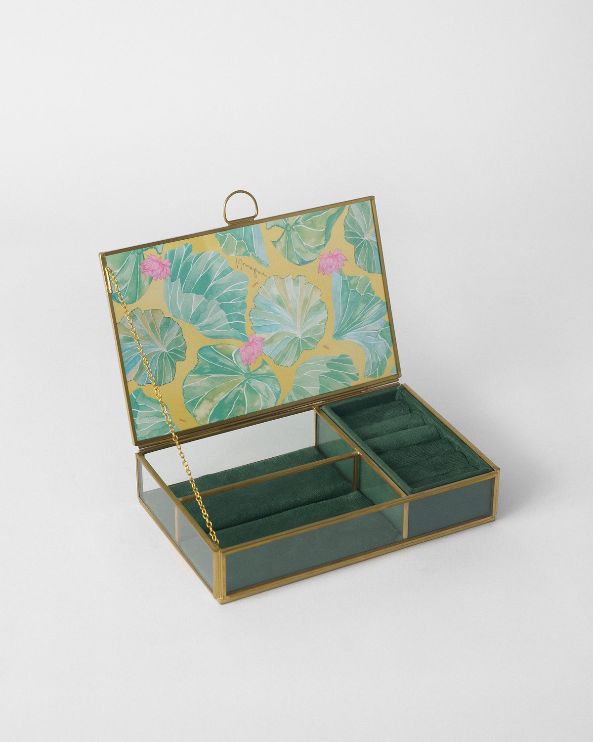 Open empty Lilly pond jewellery box with green velvet lining.