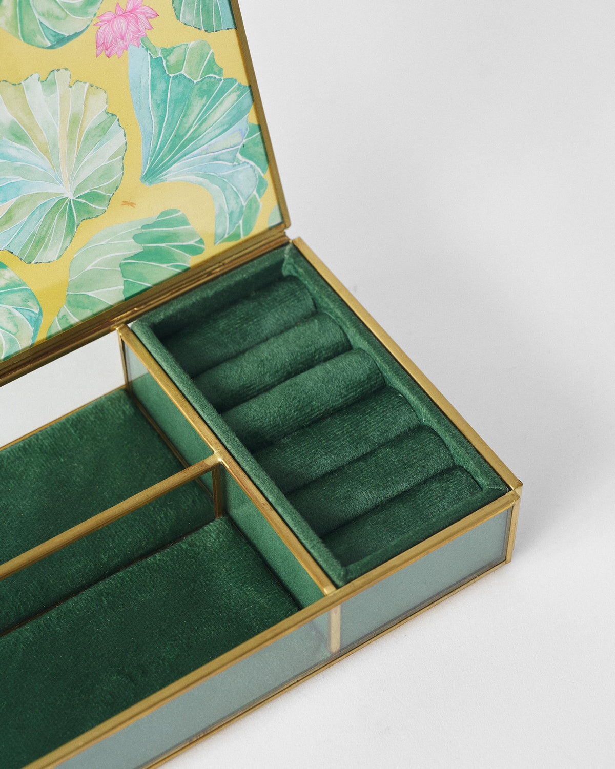 Open Lilly pond jewellery box showing ring rolls and a lily pad lid.