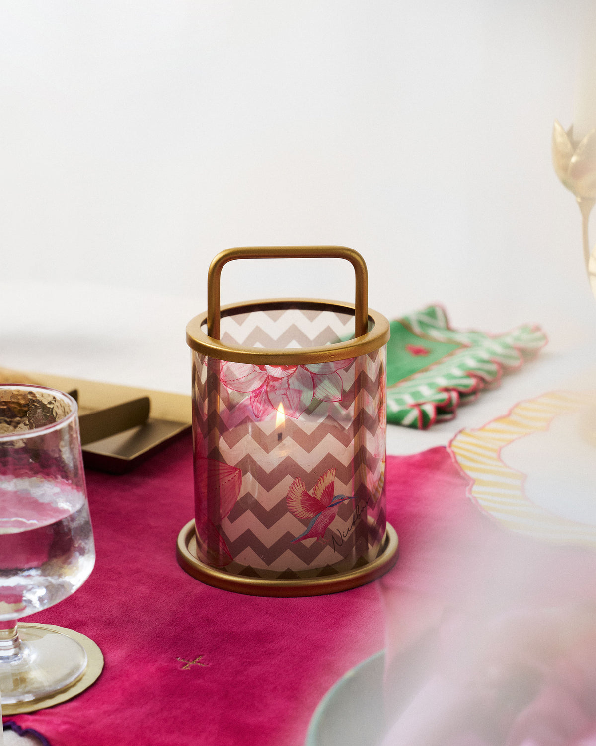 Float lantern lit from inside, showing its chevron and pink floral print.