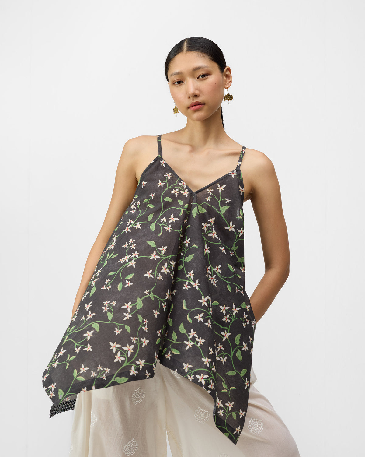 Charcoal Handkerchief Top with a jasmine print and flared pointed hem.