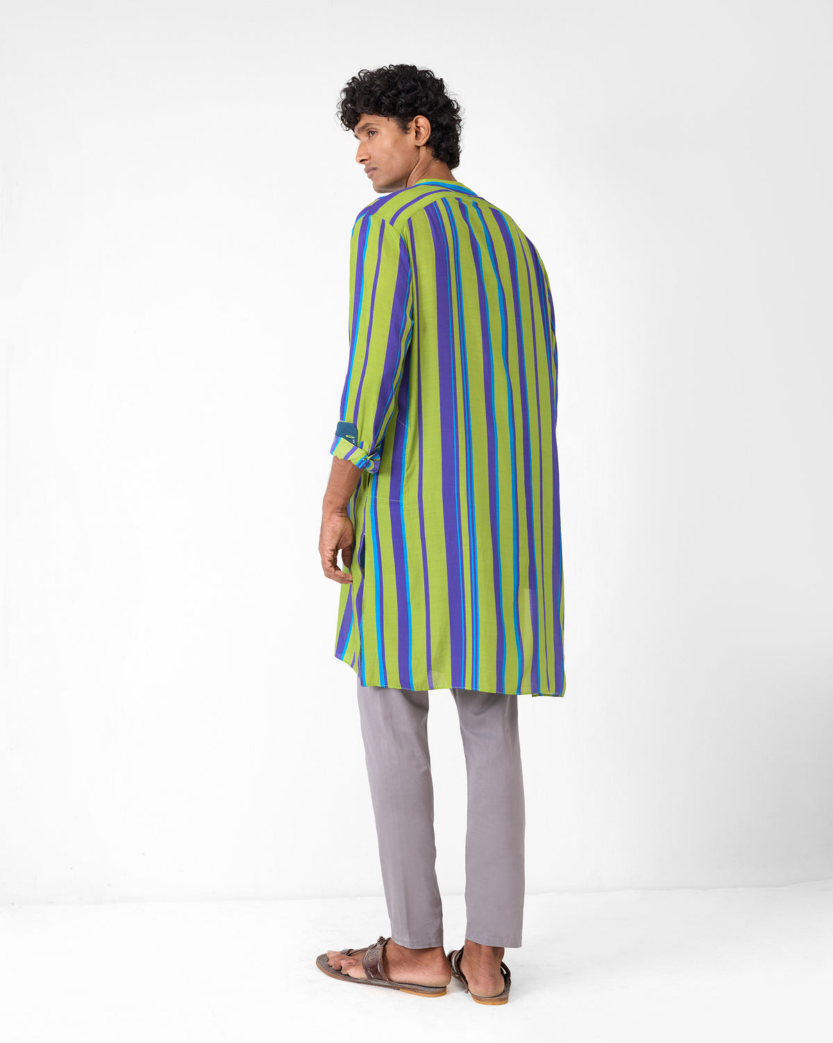 Back of a green and blue striped Jashn kurta worn at a three-quarter angle.