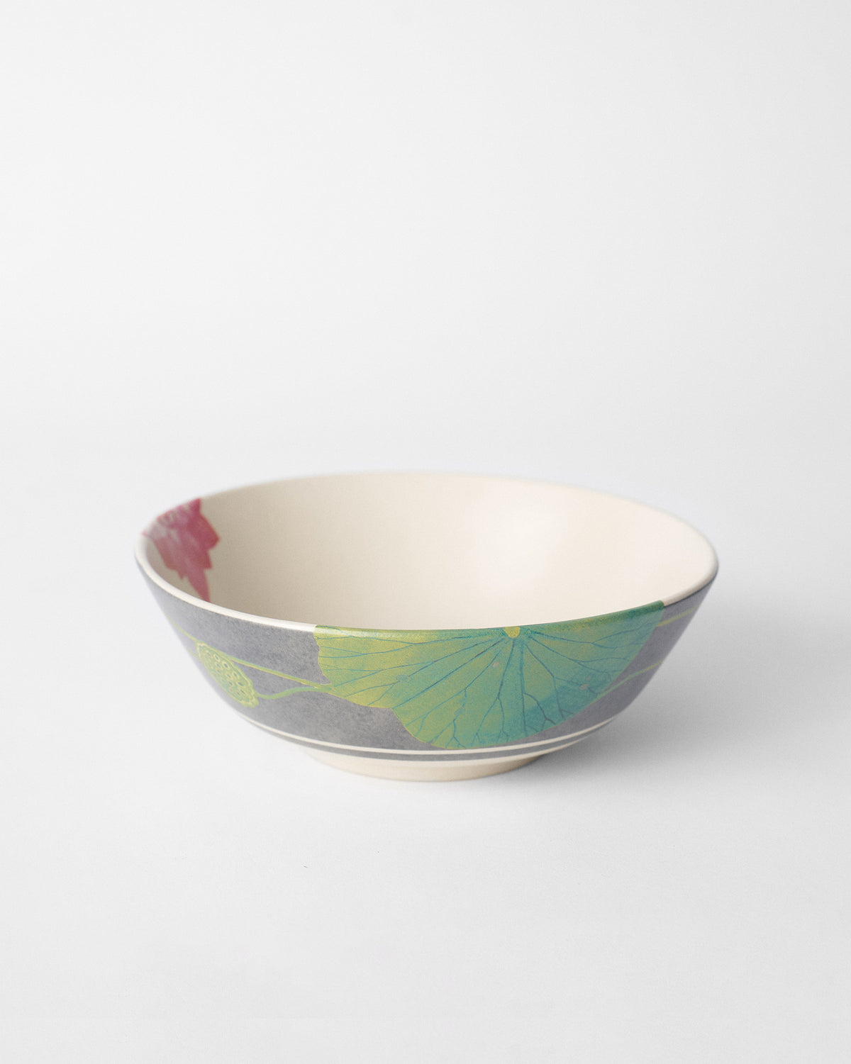 Lotus Garden curry bowl with charcoal exterior and green lily pad.