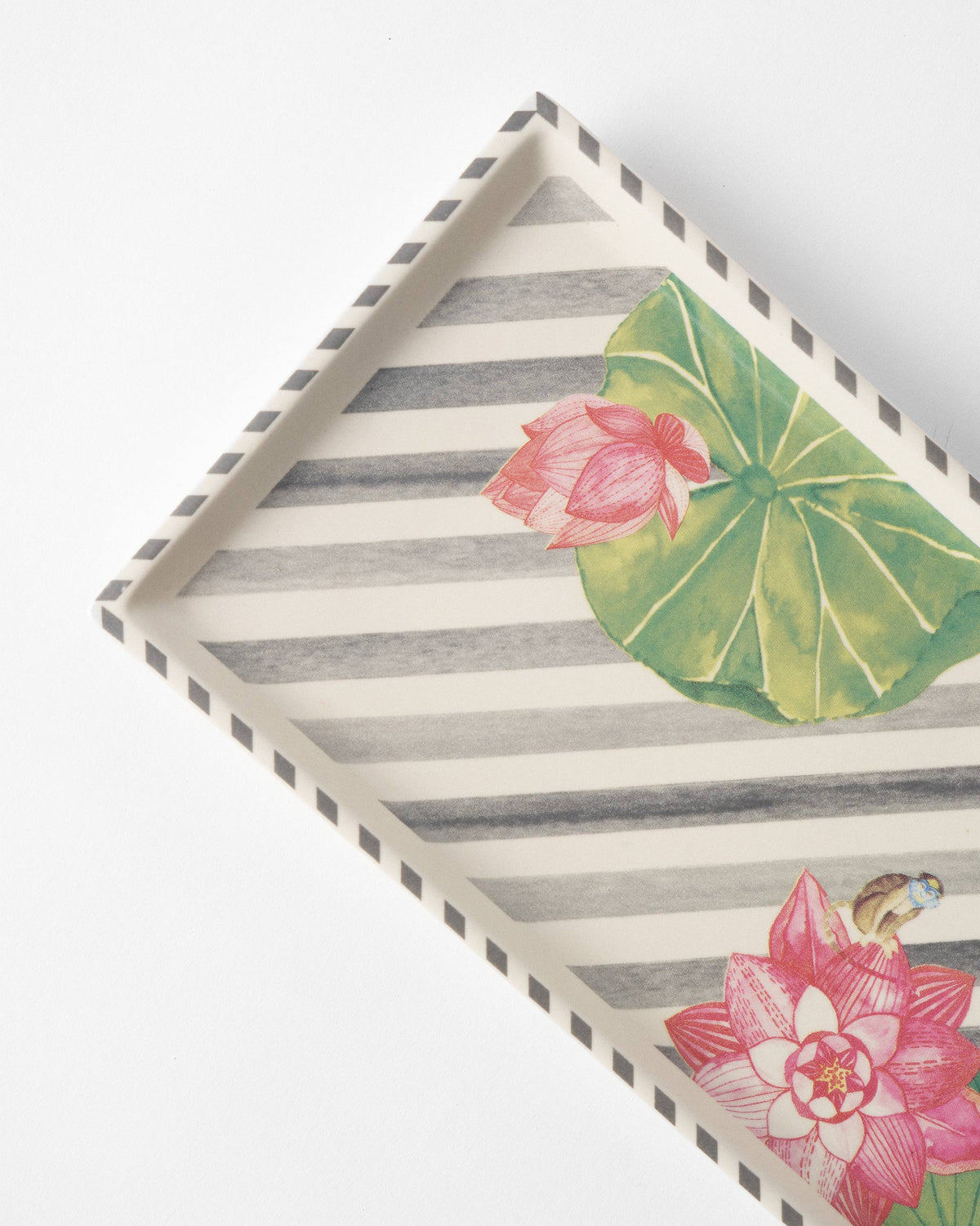 Close-up of Lotus Garden tray showing pink lotus and charcoal stripes.