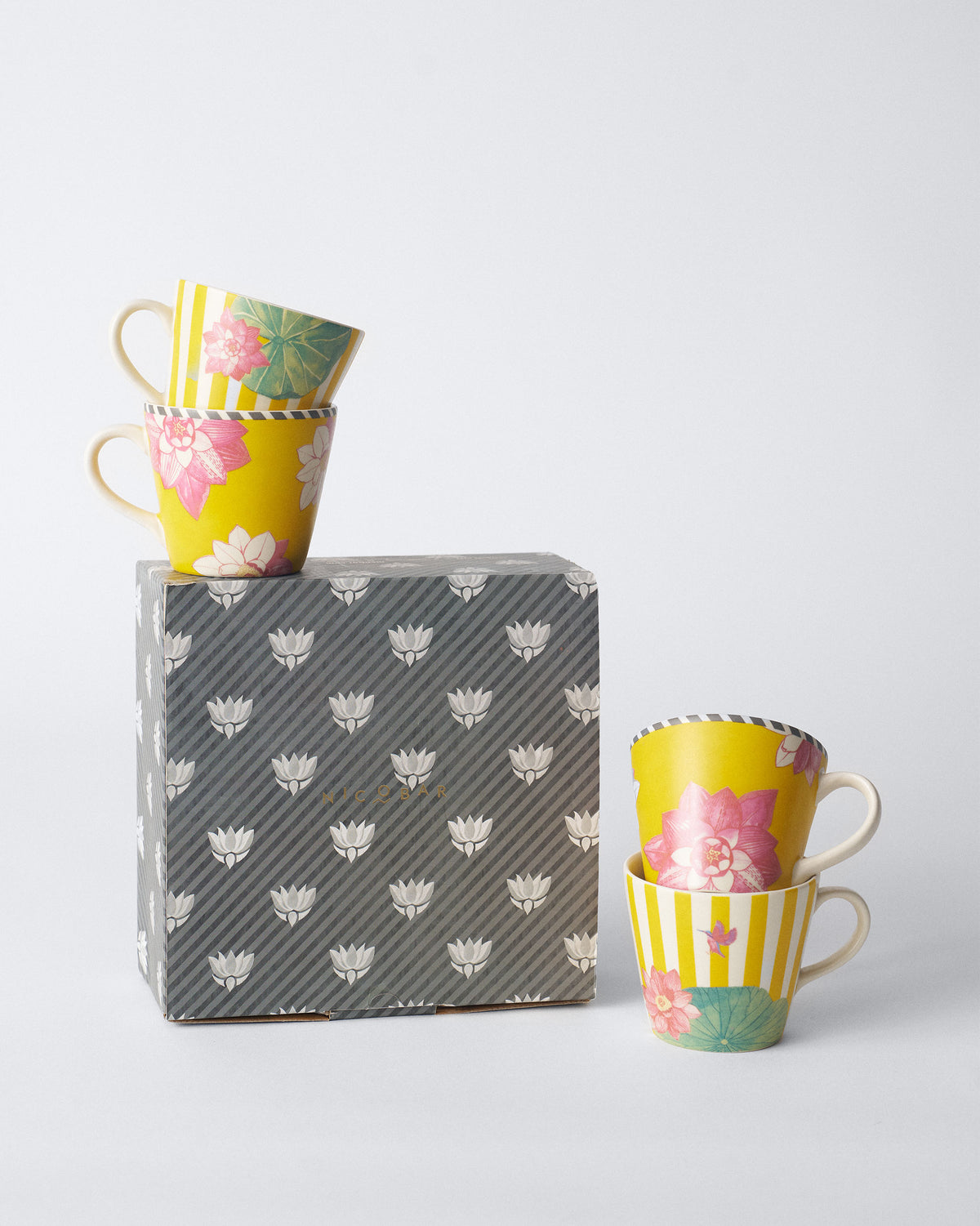 Lotus Garden espresso mug set of 4 with a patterned gift box.