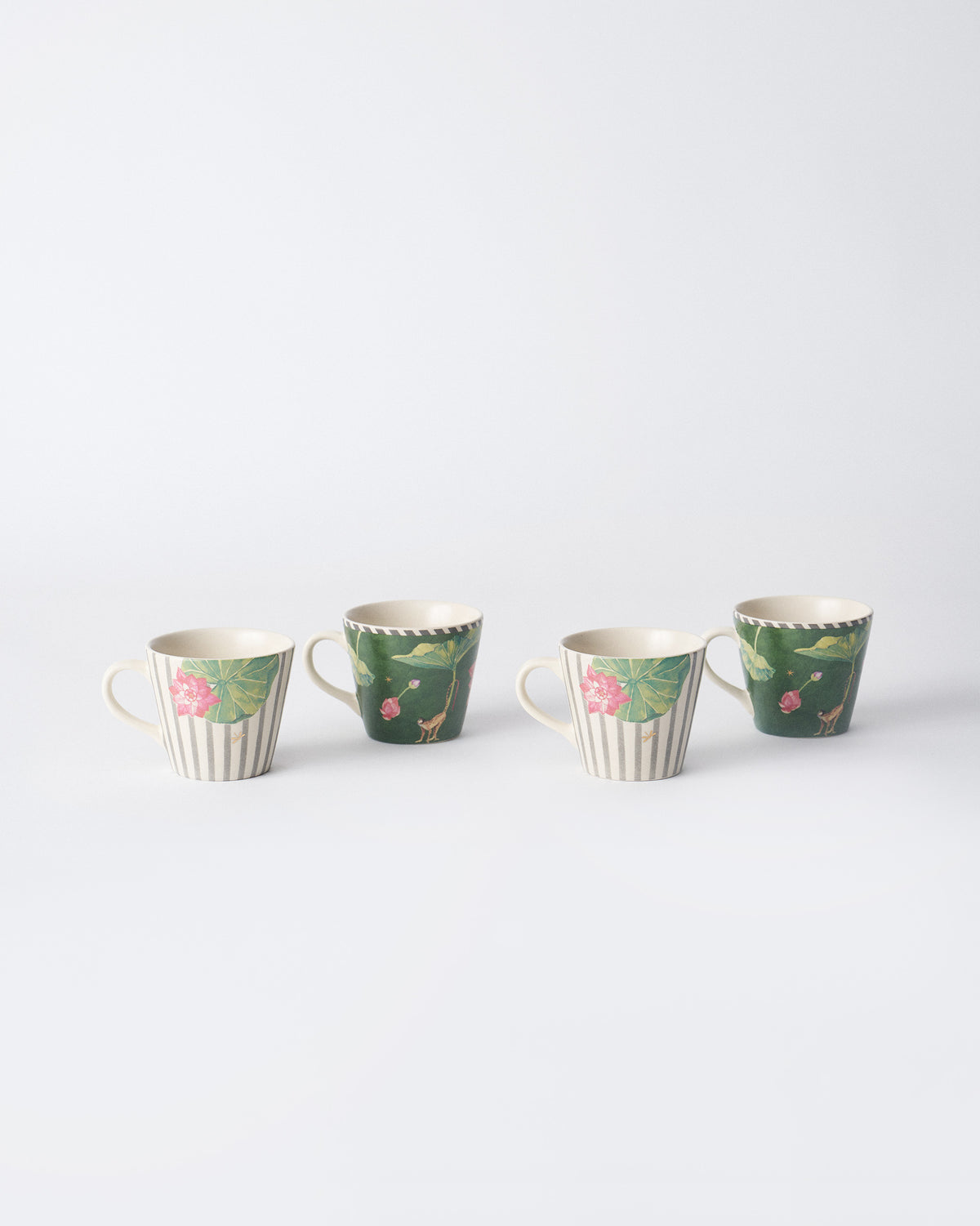 Set of four Float espresso mugs with lotus, lily pad, and monkey prints.