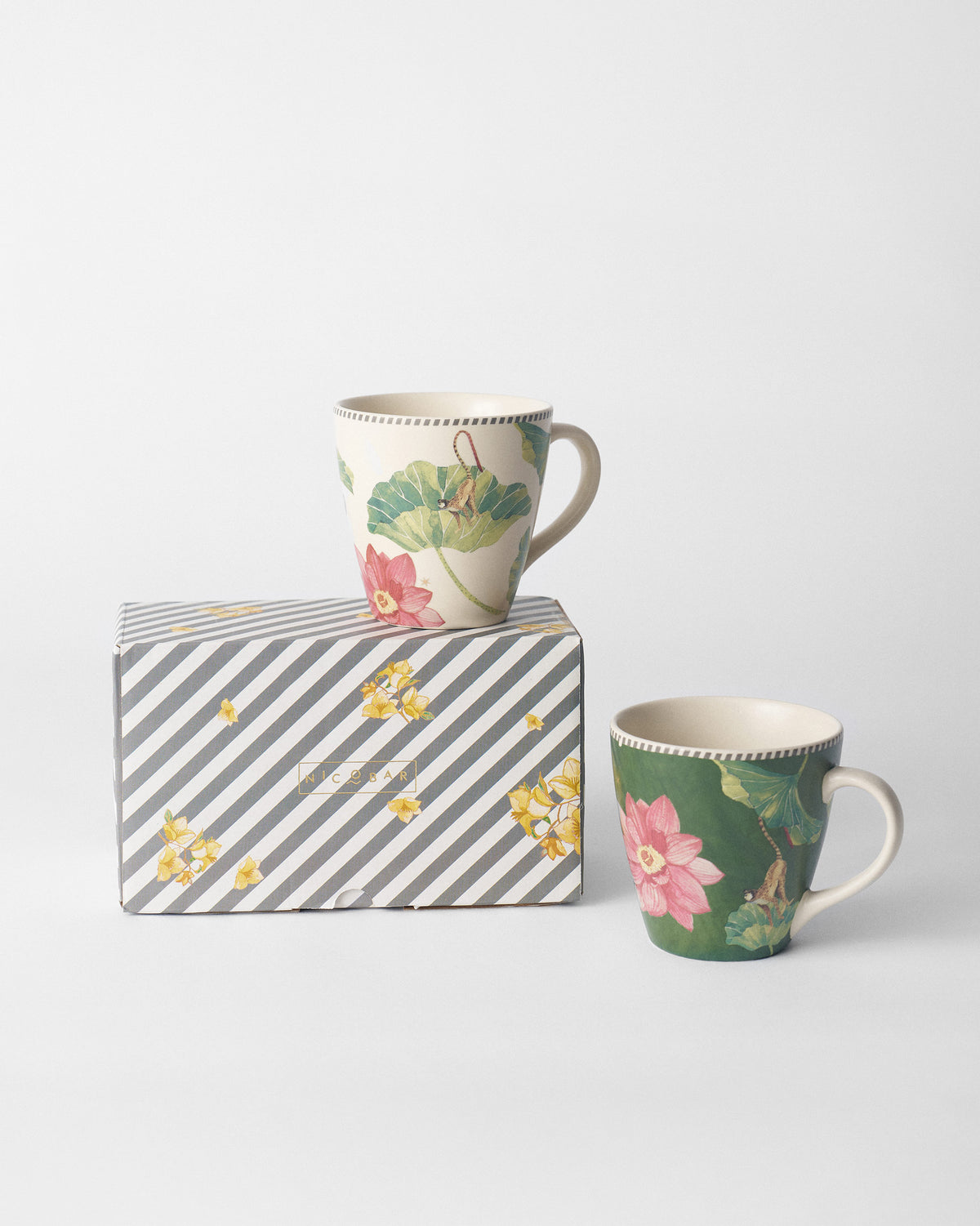 Pair of Float conical mugs with a striped Nicobar gift box.