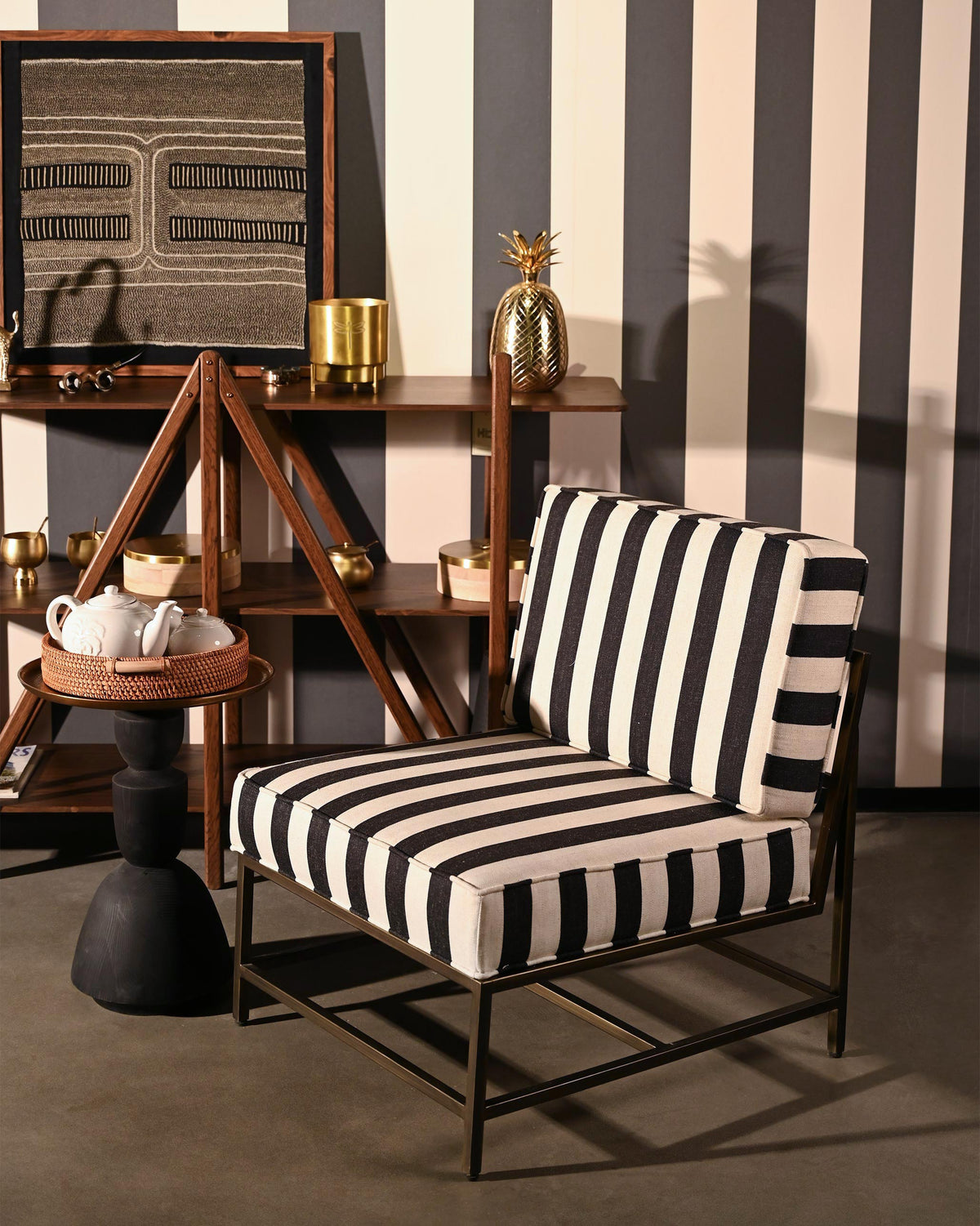 Isle Chair with black and cream striped upholstery in a room setting.