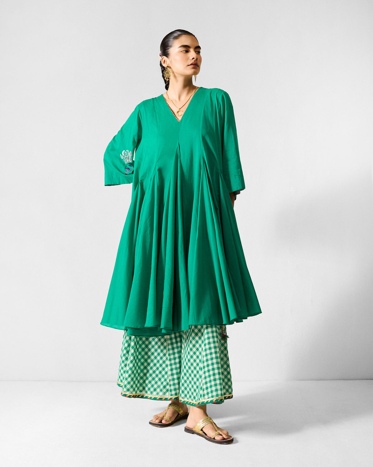 Green Gusset Long Kurta with pleats and a deep V-neck.