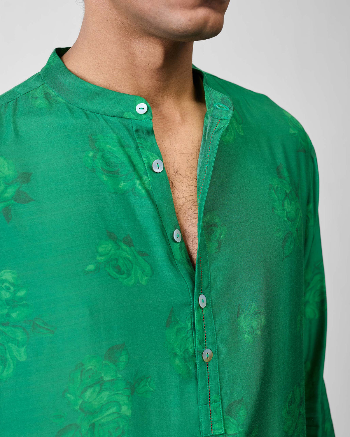 Close-up of emerald Astral kurta collar showing tonal rose print.