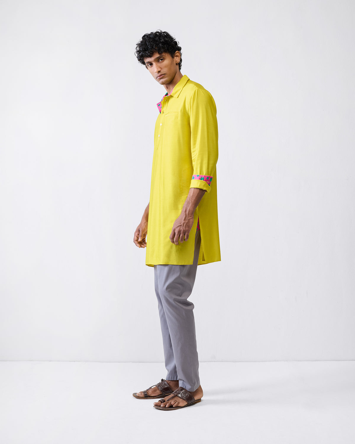 Side view of a chartreuse Bouquet kurta with side slits.