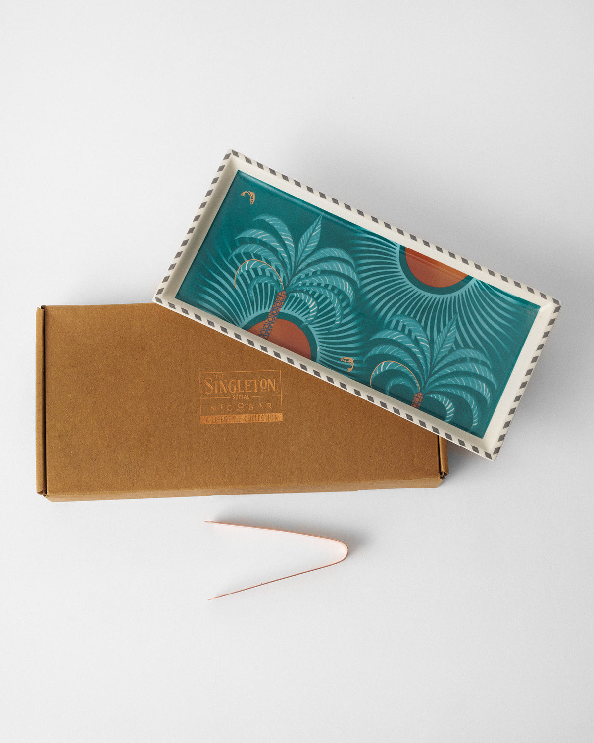 Caden cookie tray and tongs with a Singleton Nicobar kraft gift box.