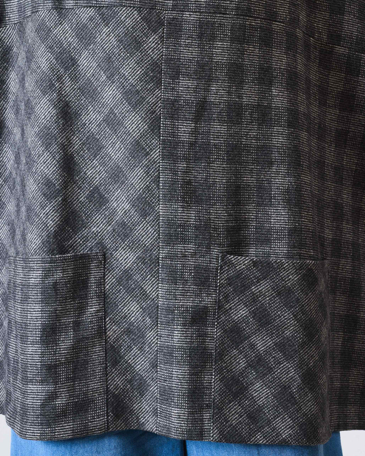 Close-up of Fable Top check panels with straight and bias grain and pockets.