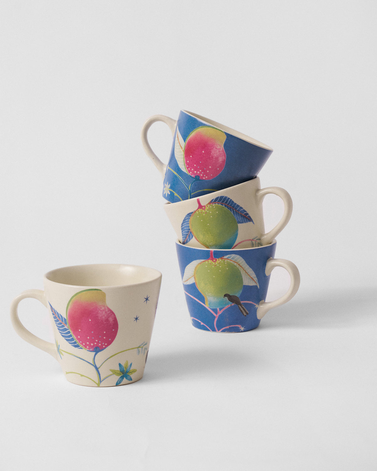 Ambi Espresso Mugs with mango prints in cream and blue.