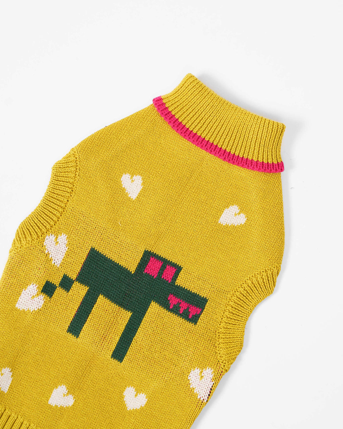 Close-up of a chartreuse Jurassic Bark dog sweater showing the green dino.