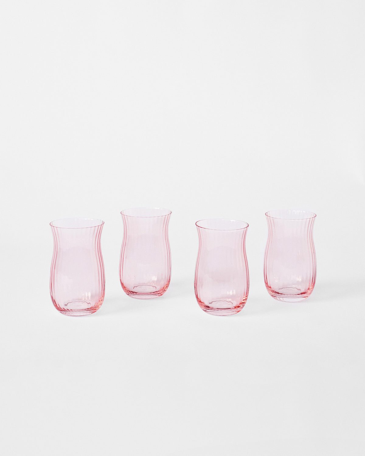 Four pink Ripple tumblers showing fluted tulip shapes.