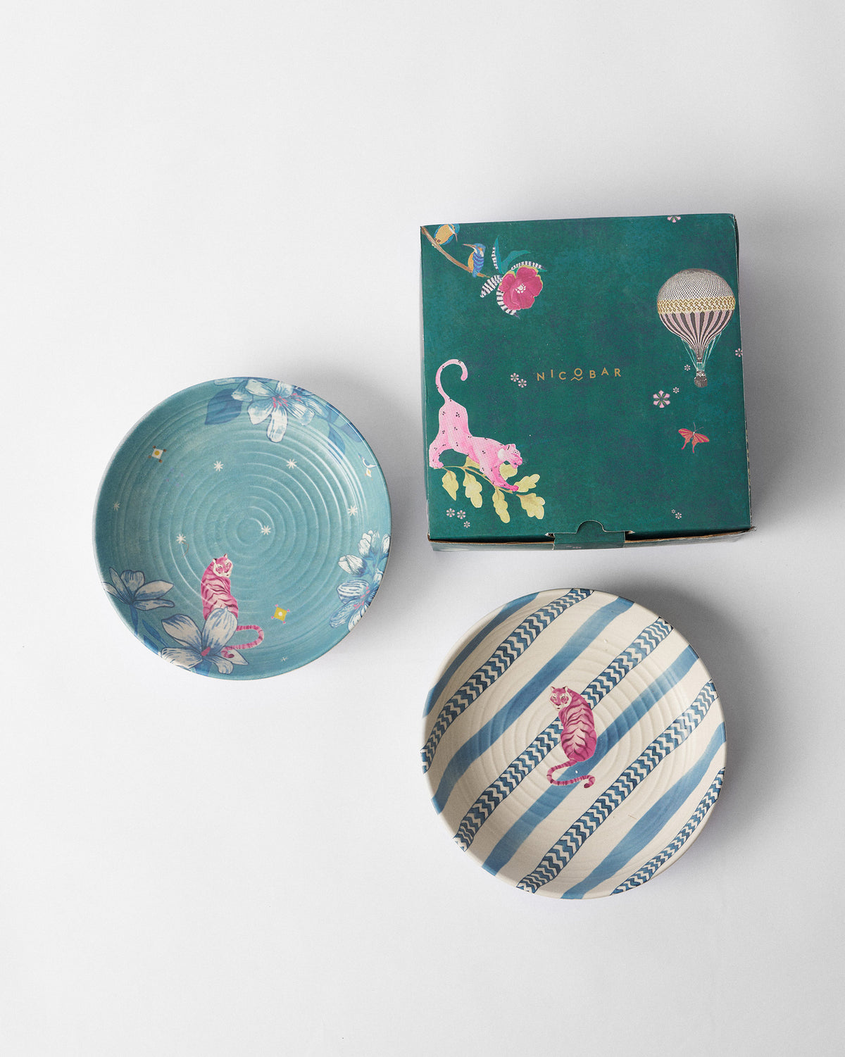 River Tiger shallow bowl set of two with a green Nicobar gift box.