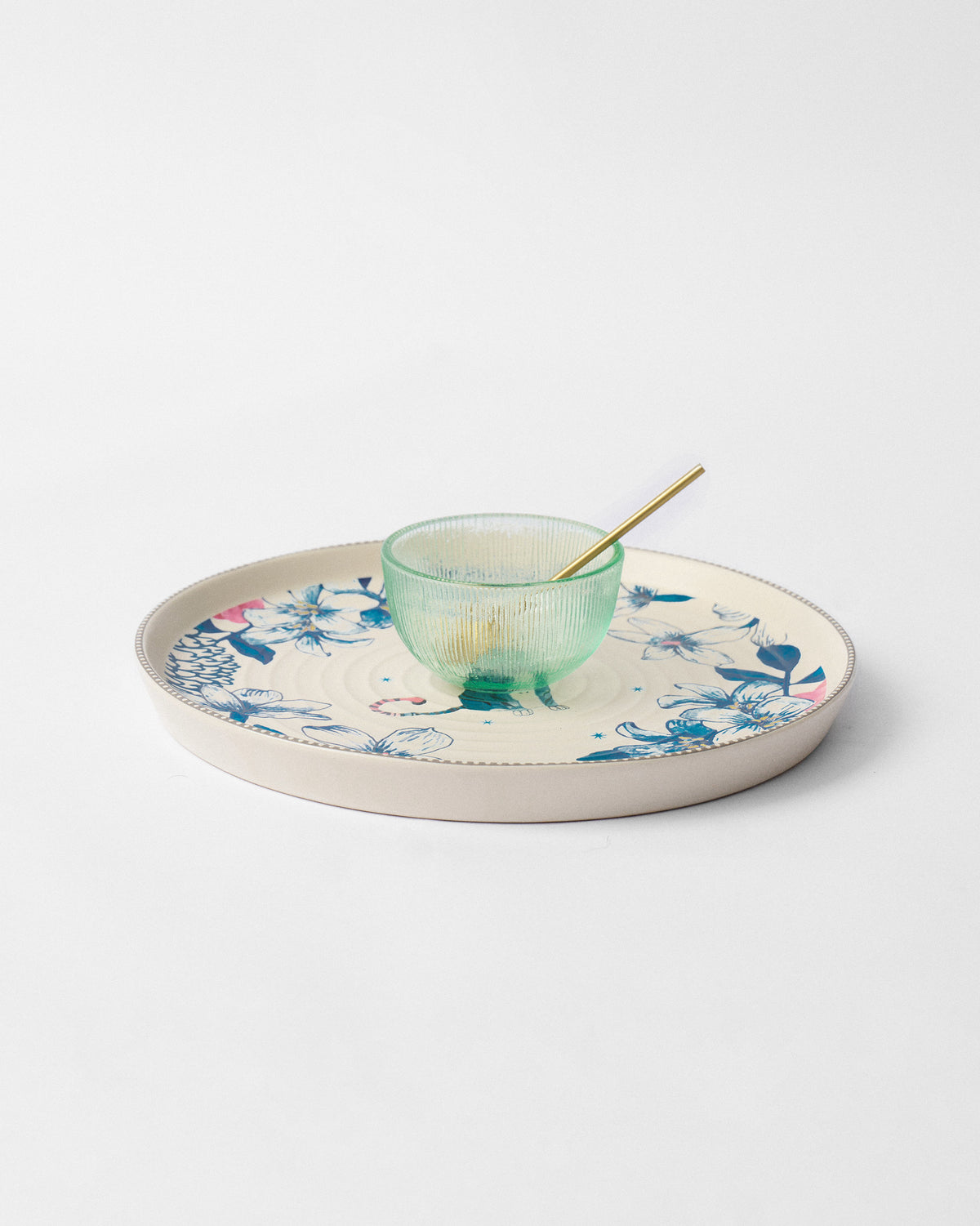 River Tiger chip and dip platter with teal bowl and gold spoon.