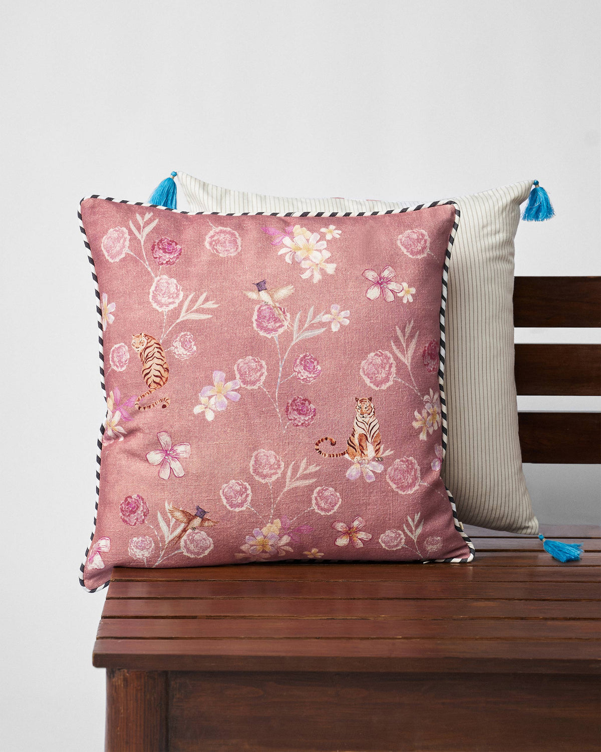 River Tiger Cushion Cover in pink with tiger and flower motifs.