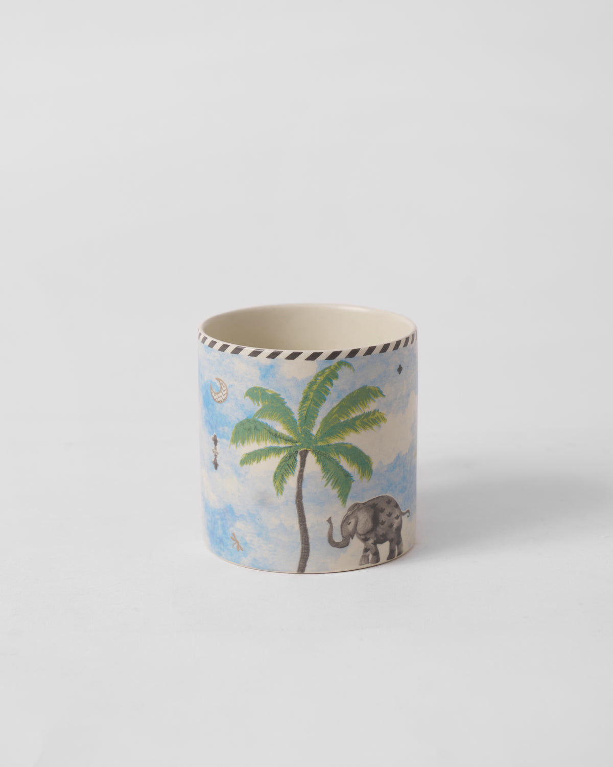 Kandy Straight Mug with a palm tree and an elephant printed on it.