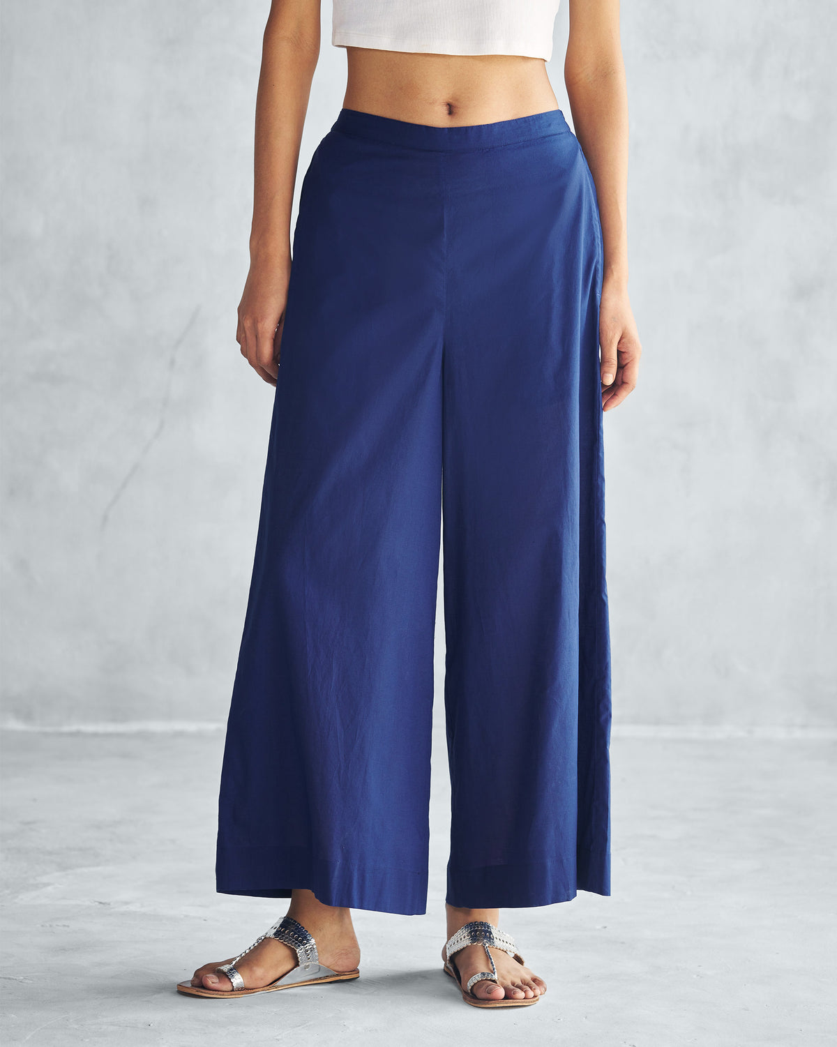Person wearing ink blue Basic Pyjamas with wide legs.