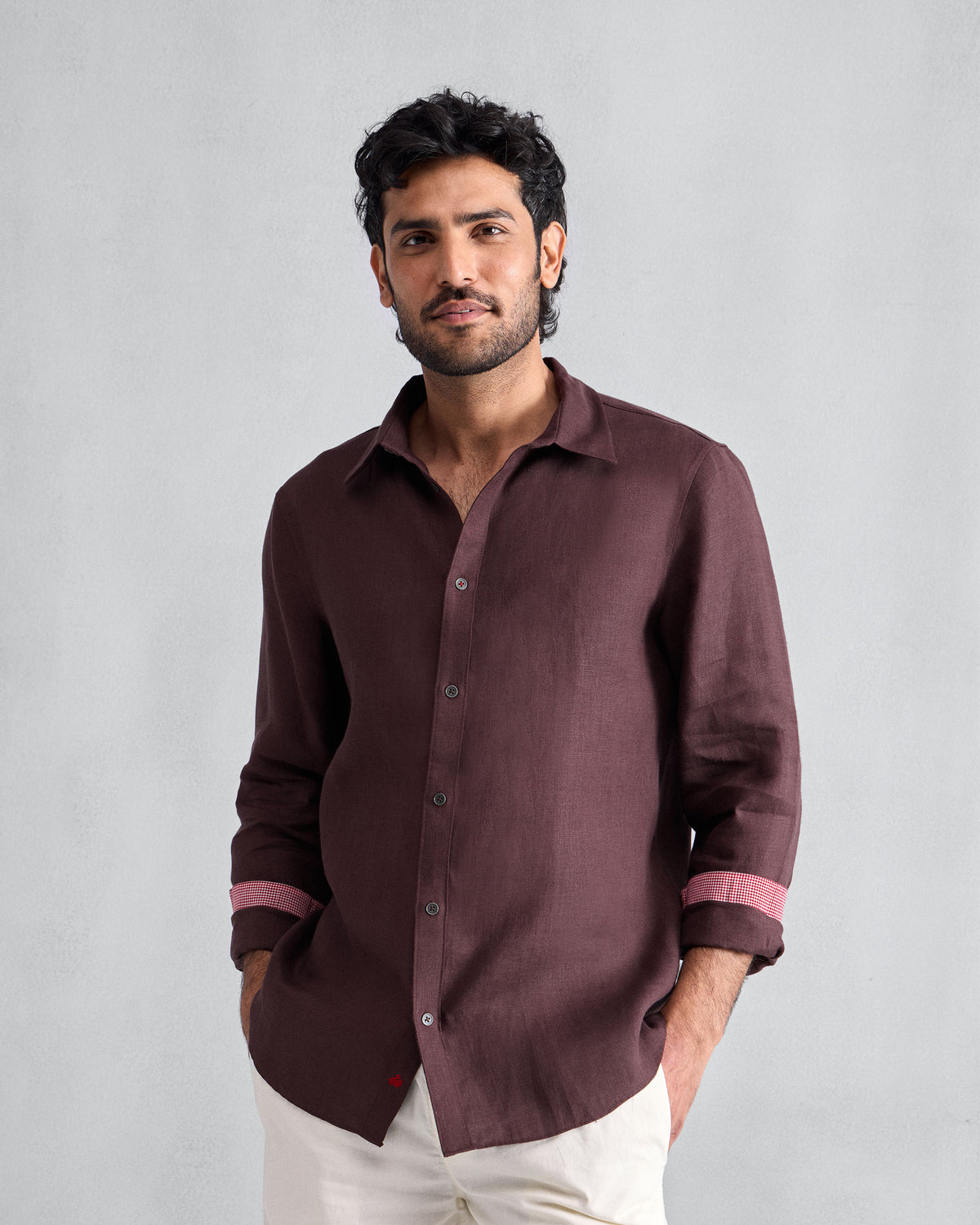 Person wearing a chocolate plum Classic shirt.