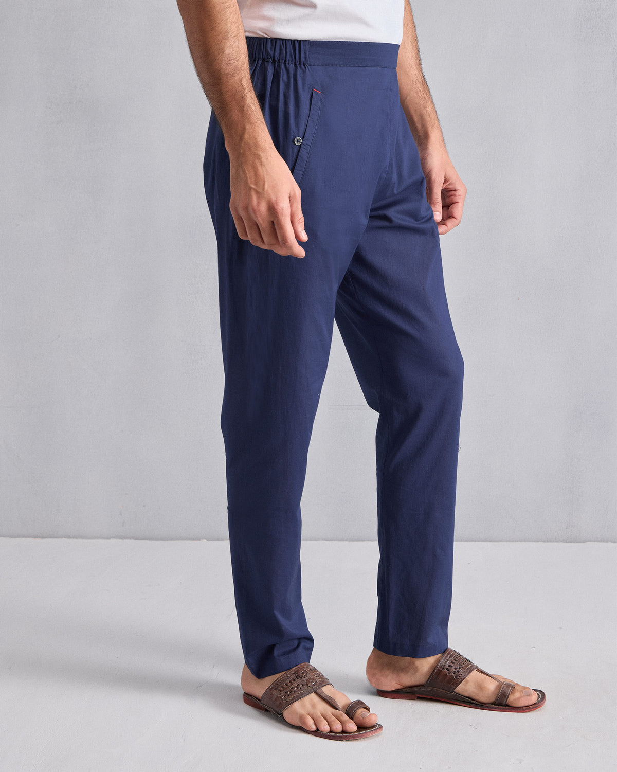 Side view of ink blue Kurta Pants showing the buttoned pocket.