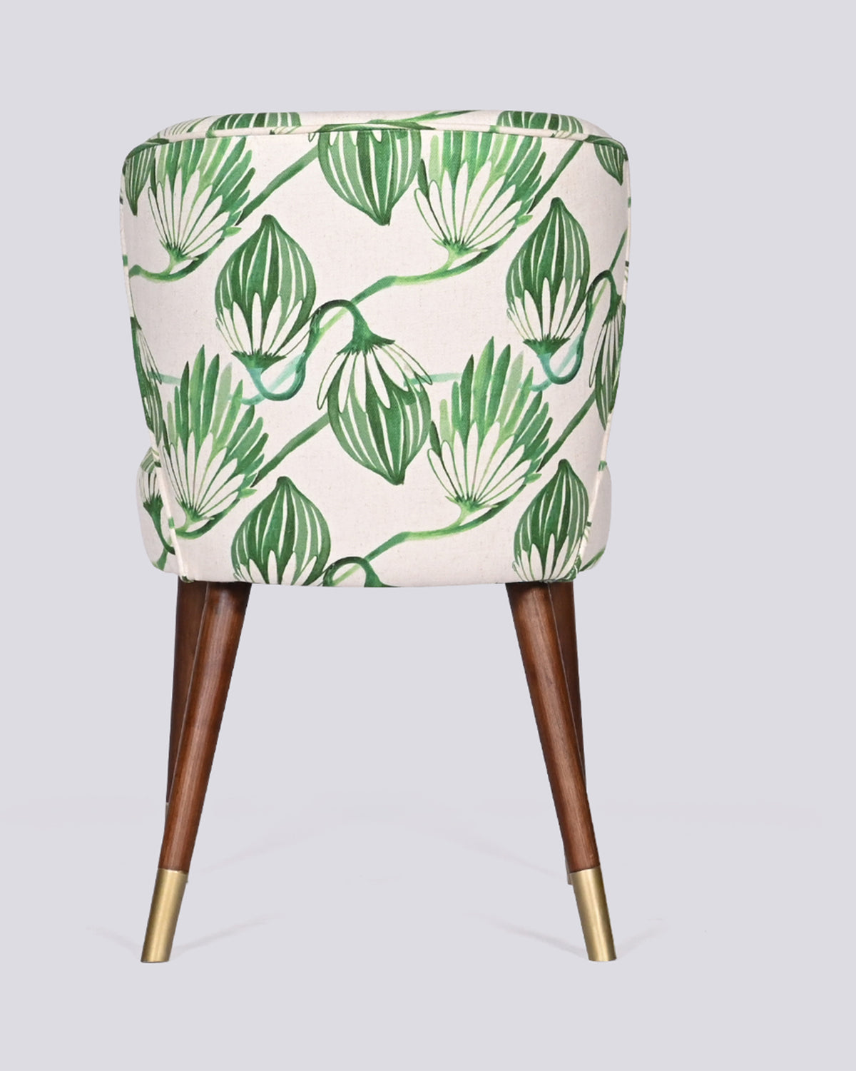 Back of the Breeze Dining Chair covered in green blooms print.