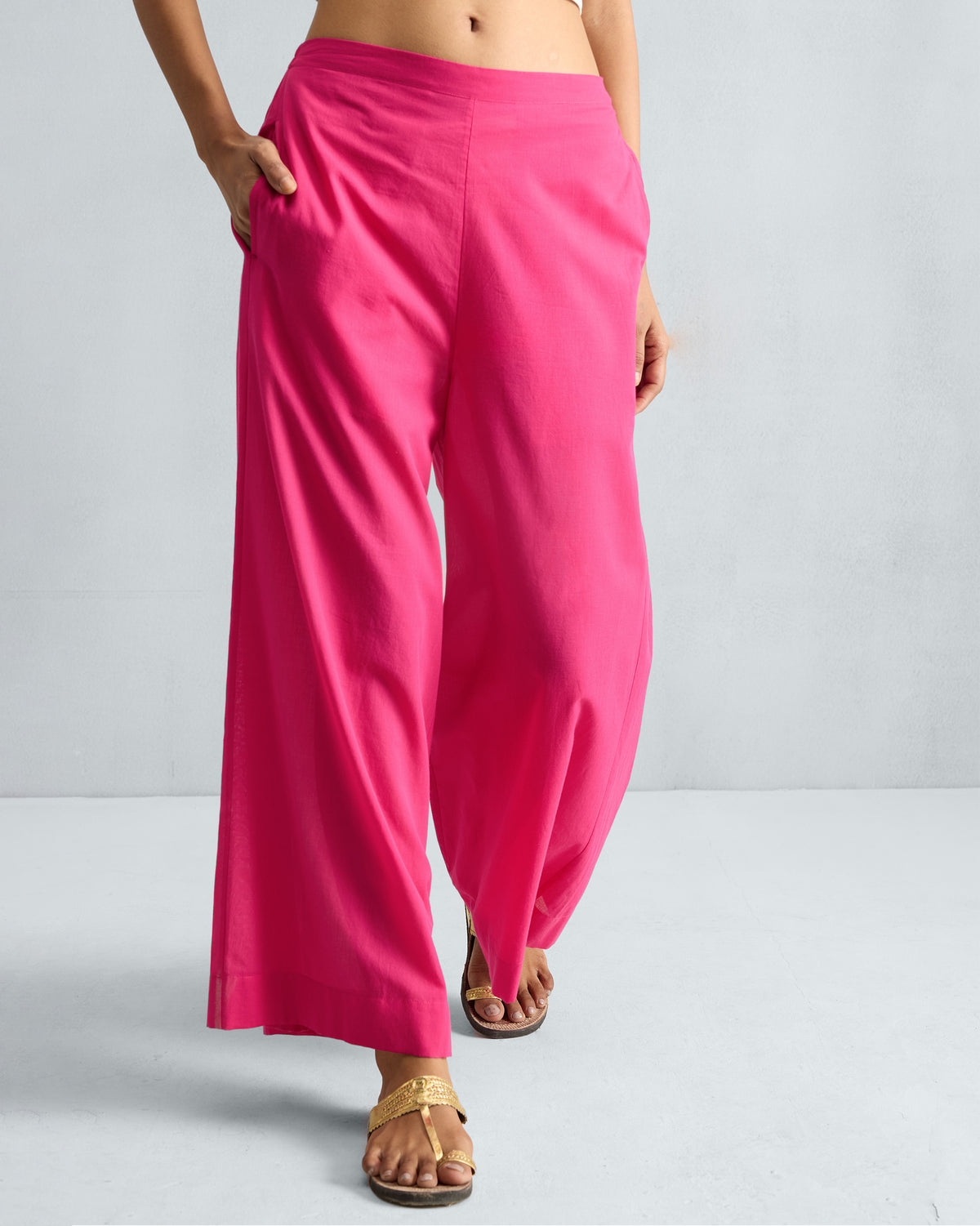 Person wearing fuchsia Basic Pyjamas with side pockets.