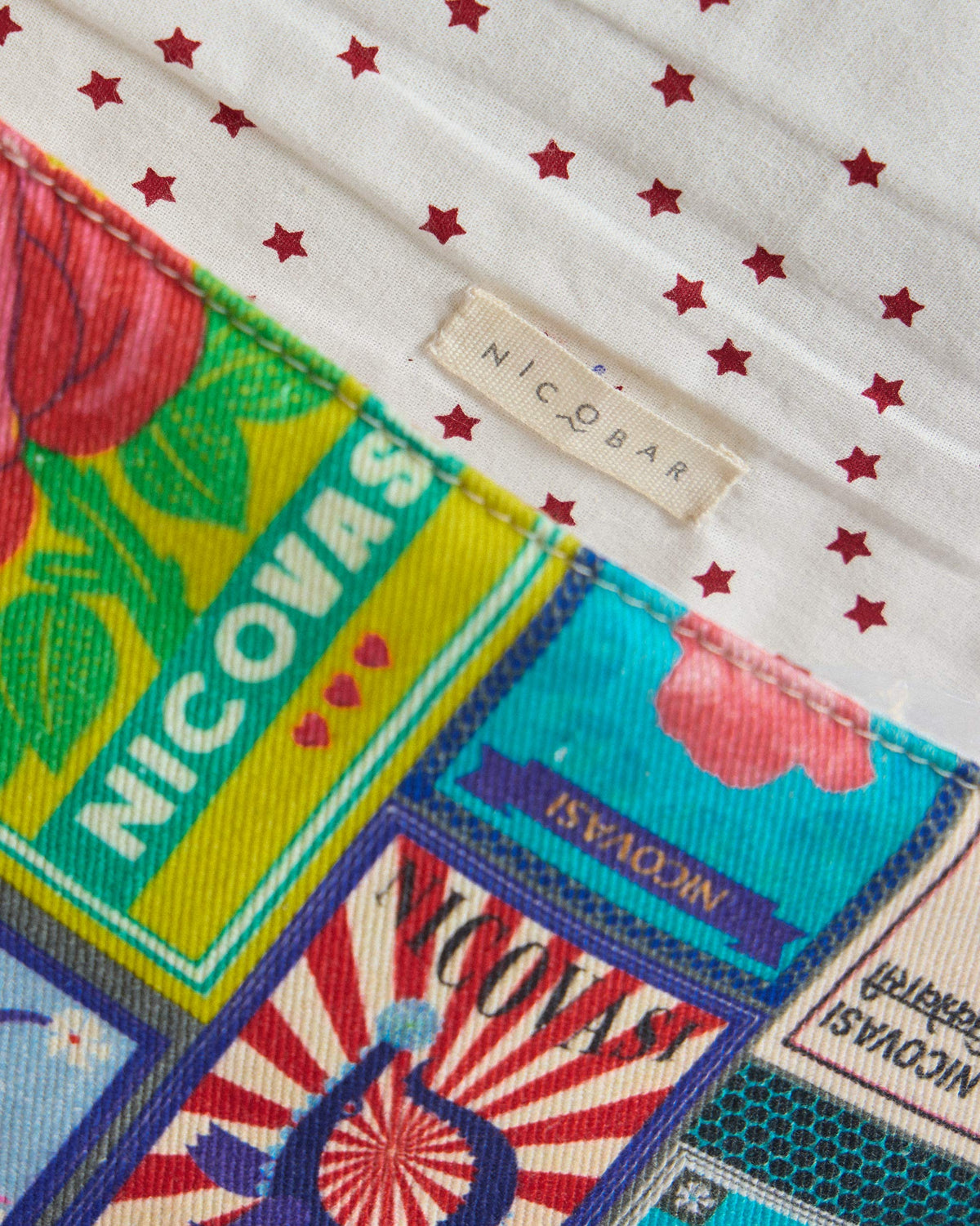 Close-up of the Matchbox Laptop Sleeve lining and Nicobar label.