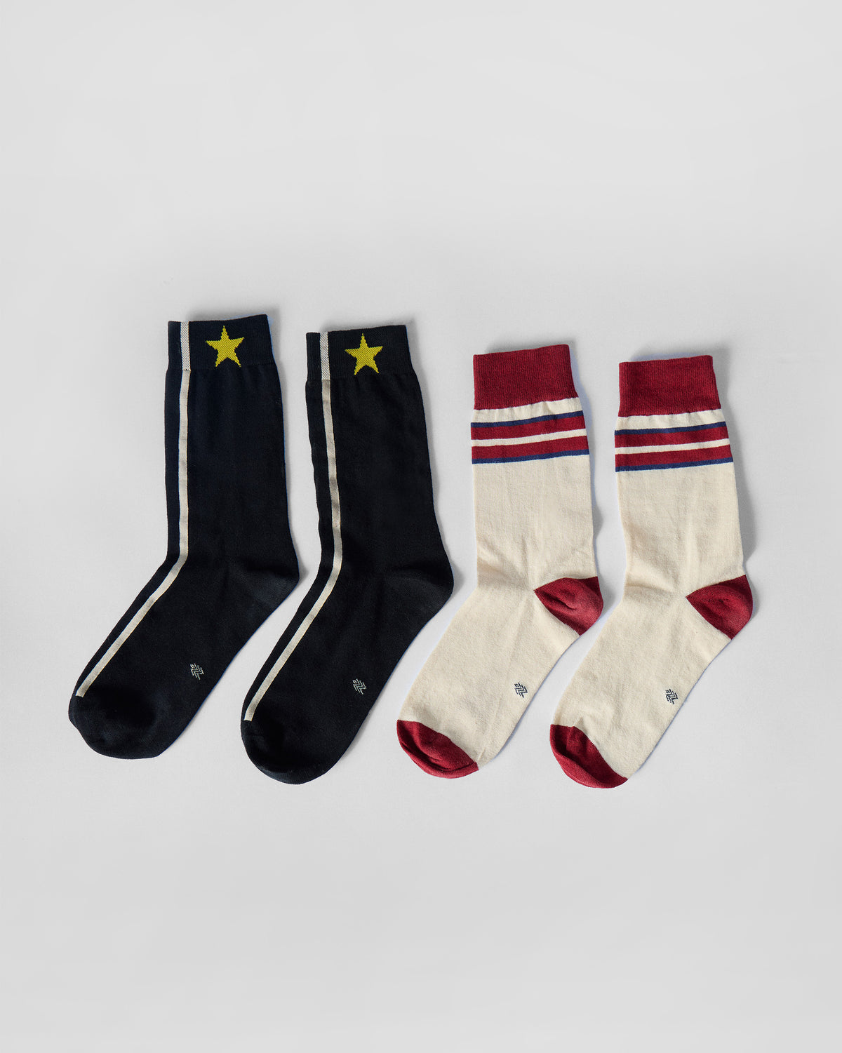 Men's Orbit Socks set with black star-stripe and cream maroon pairs.
