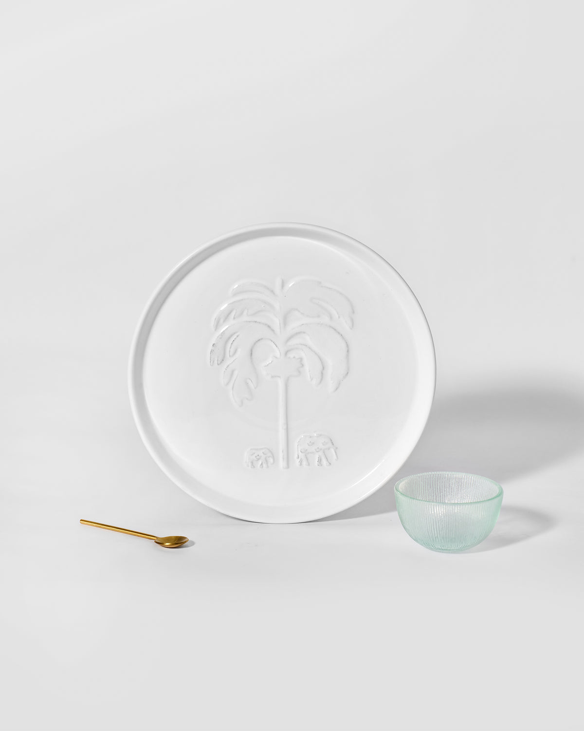 Ele Palm Chip & Dip Platter in white with an embossed palm and two elephants.