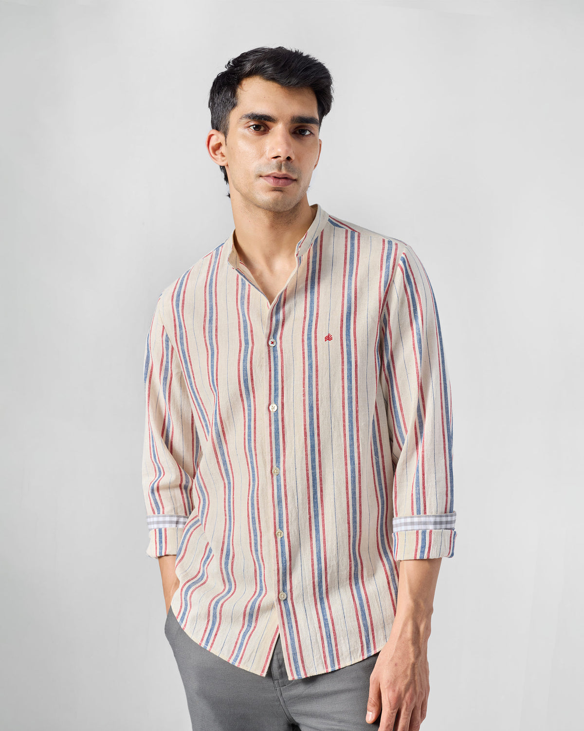 Nawab Shirt front in ivory with red and blue stripes and band collar.