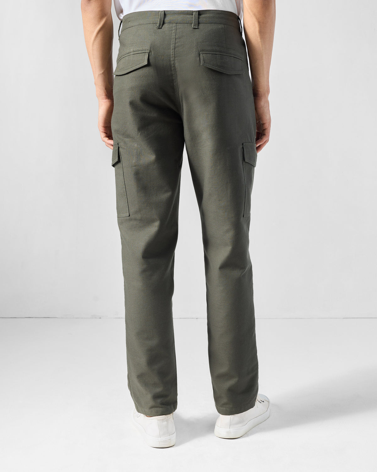 Back of olive Riverbank pants showing rear flap pockets.