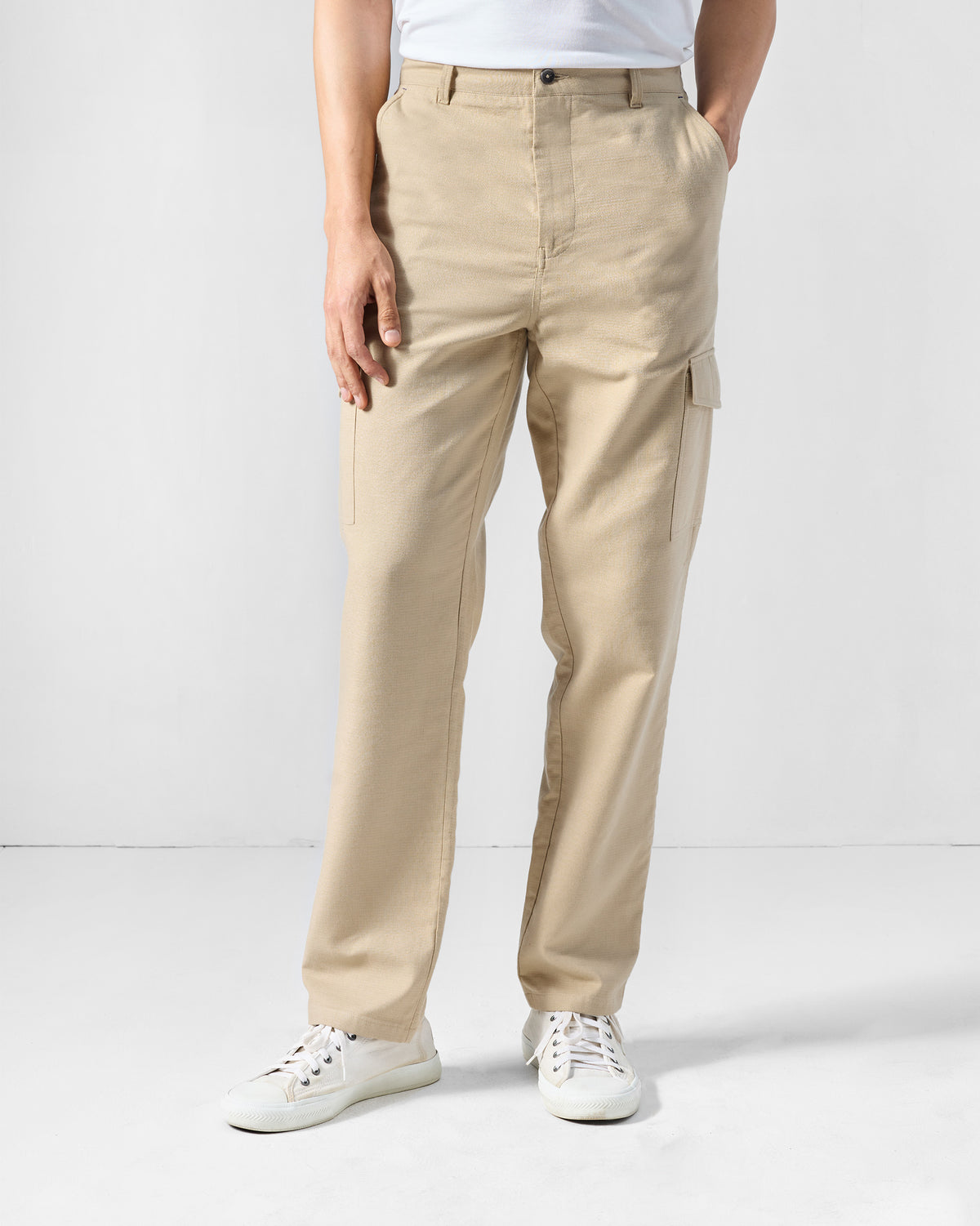 Natural Riverbank pants with cargo pockets worn straight-leg.