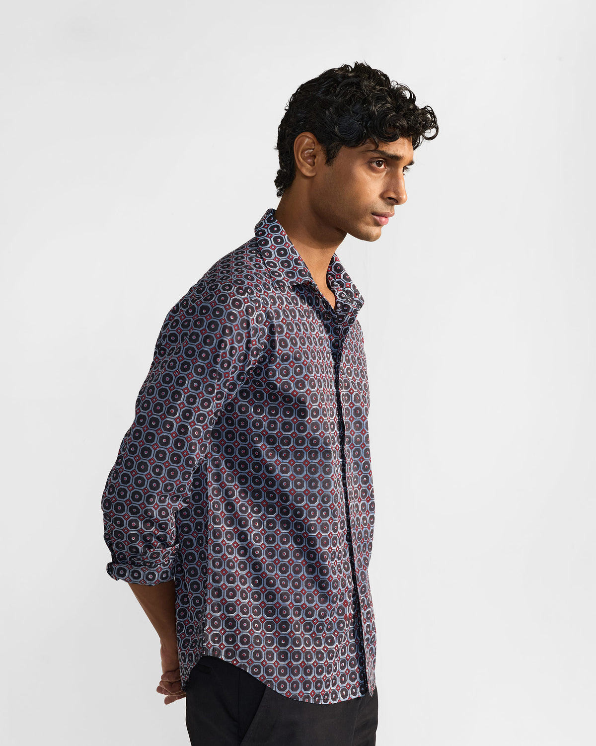 Wood Pigeon Shirt side profile with rolled sleeves in a geometric print.