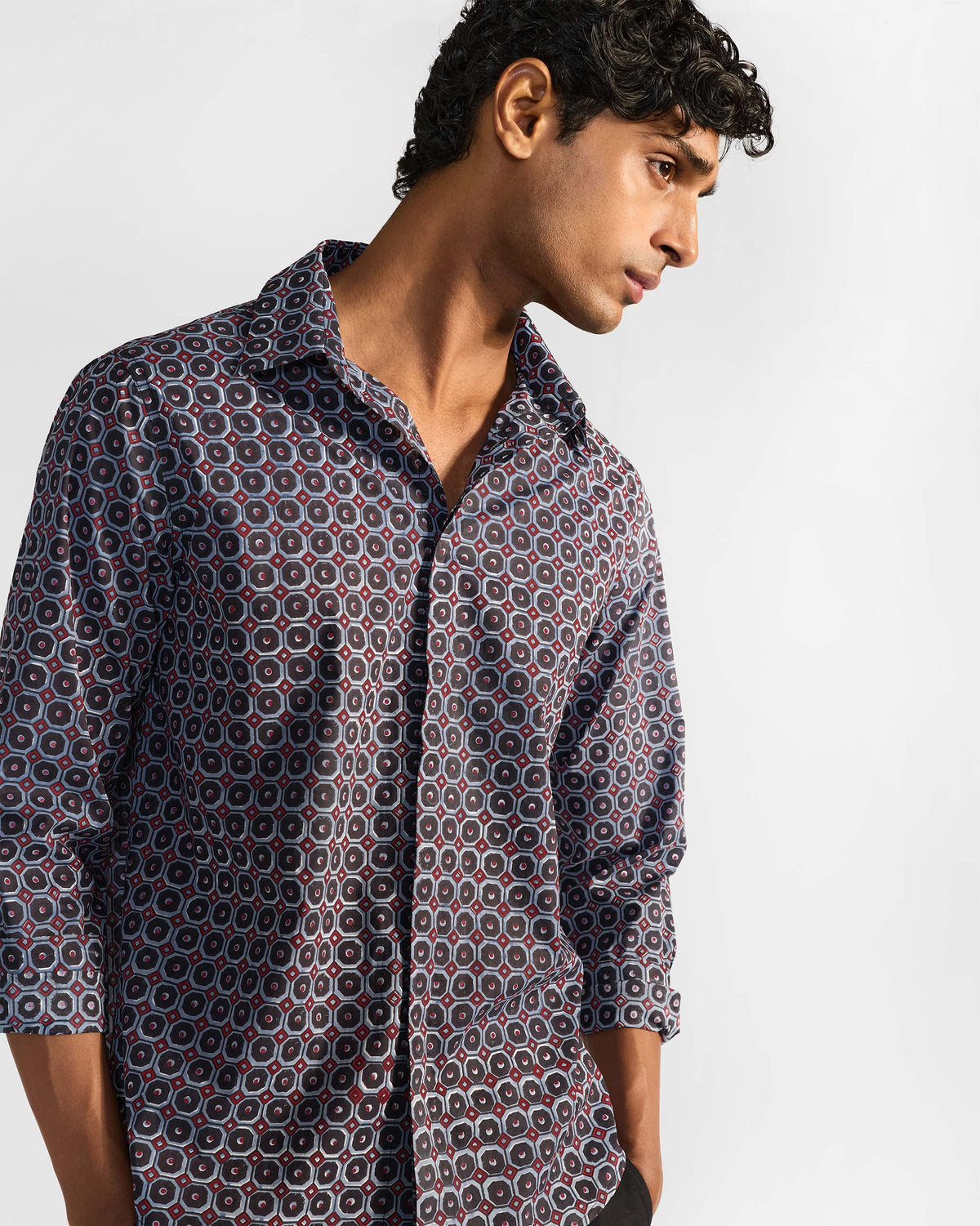 Wood Pigeon Shirt three-quarter front in a navy geometric block print.