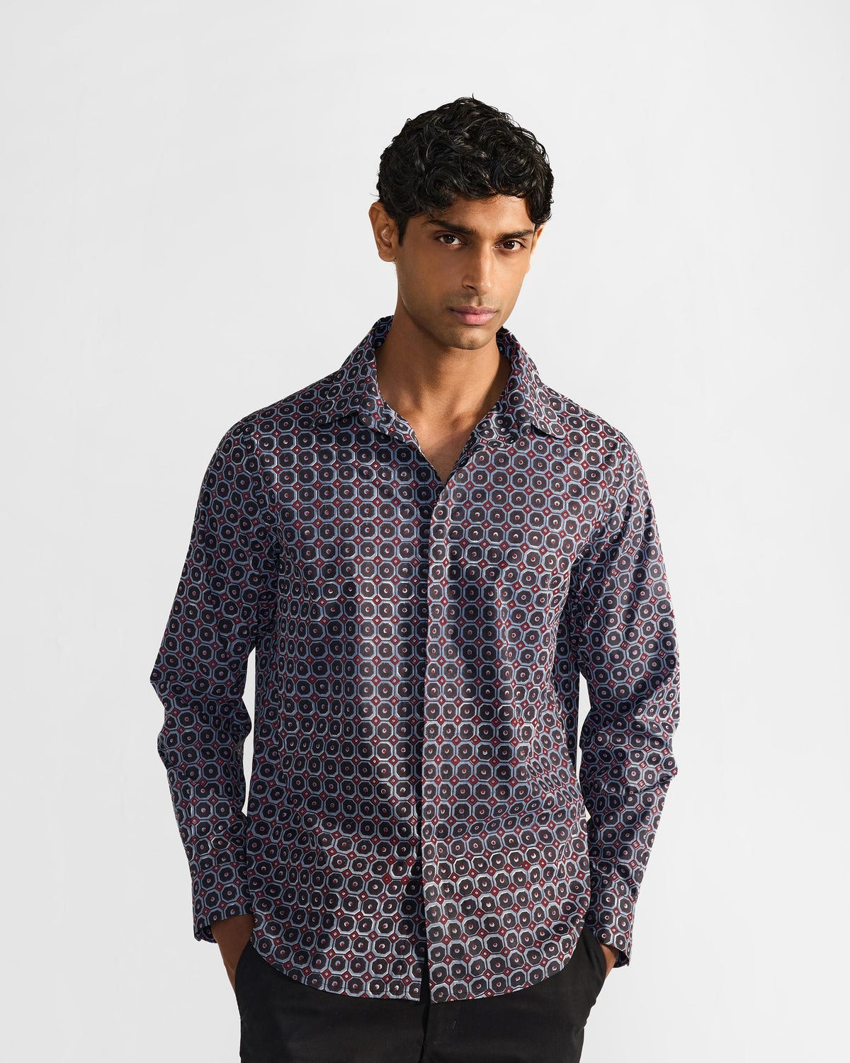 Wood Pigeon Shirt front in a navy geometric print with red accents.