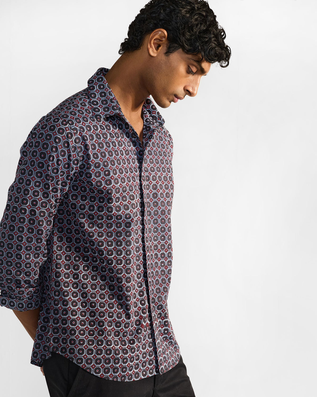Wood Pigeon Shirt side view in a navy geometric block print.