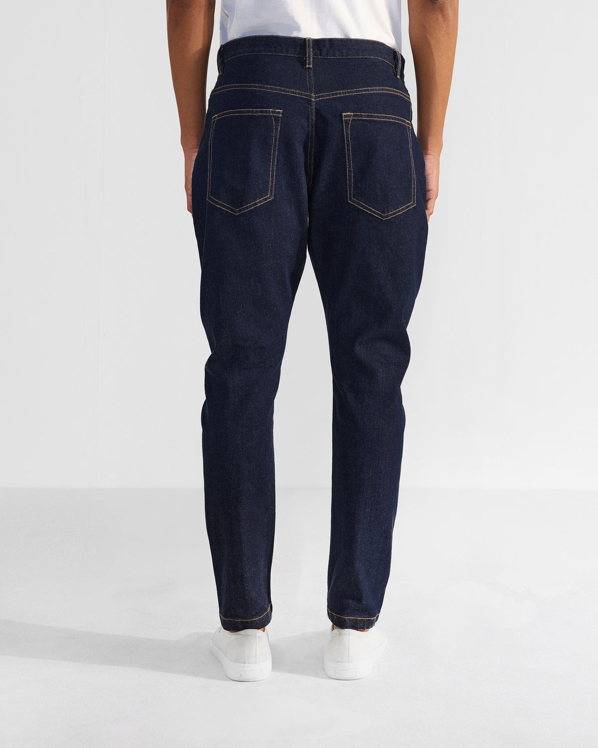 Back of denim Robin Jodhpur Pants with patch pockets and contrast stitching.
