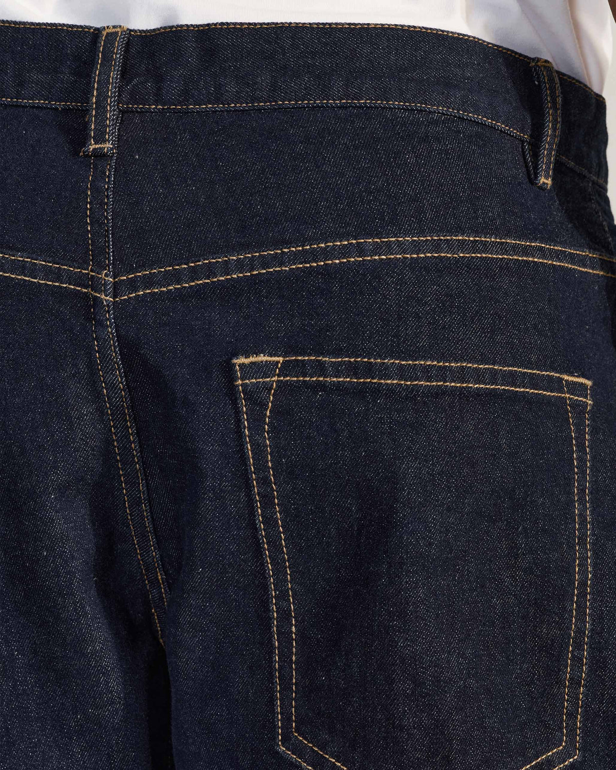Close-up of a back patch pocket on denim Robin Jodhpur Pants.