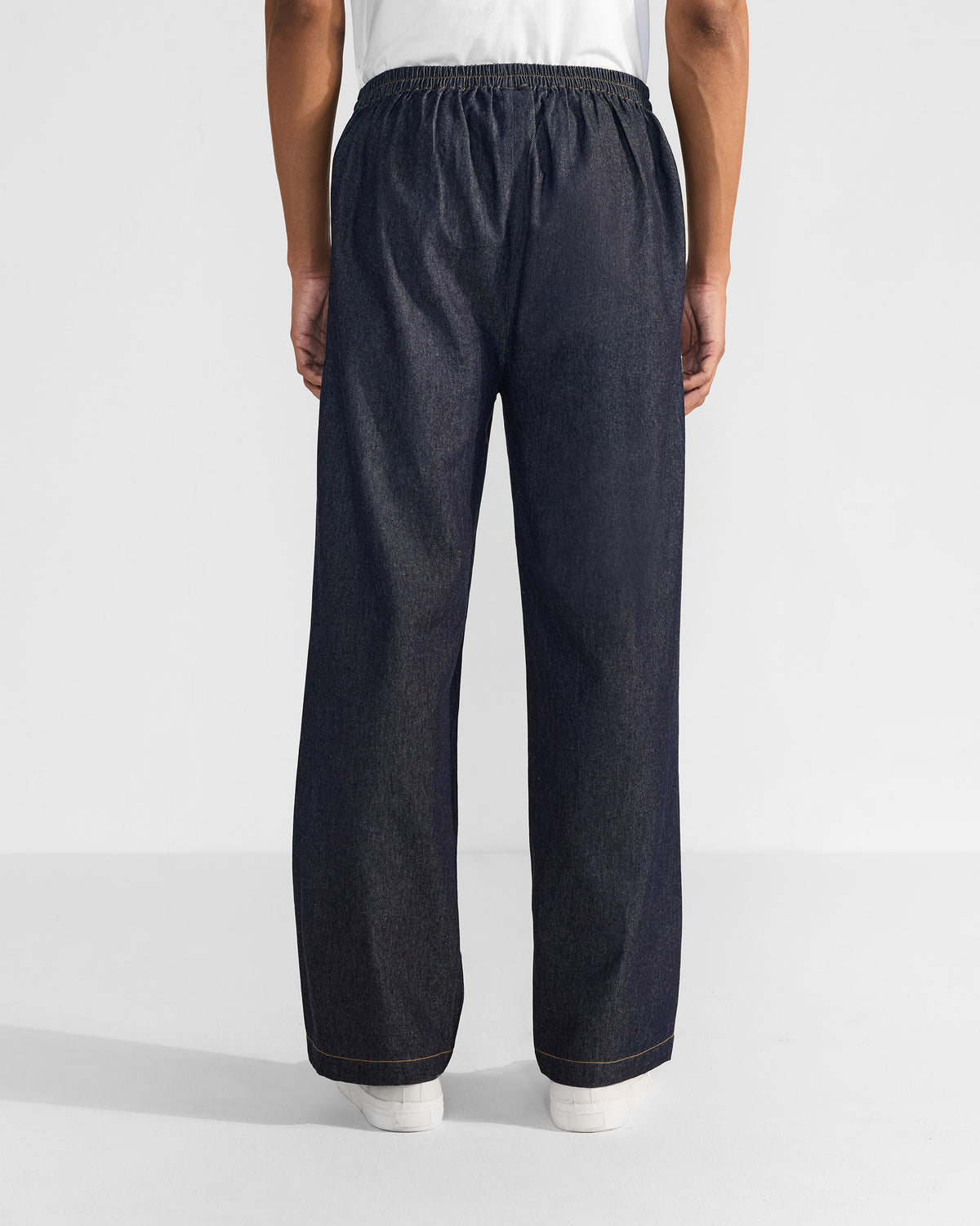 Back of denim Thrush Trousers with a relaxed wide-leg fit.